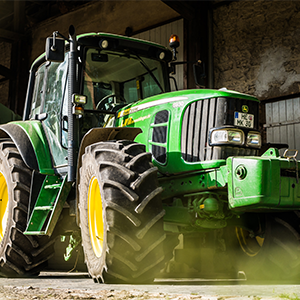 Green tractor shown as an example of farm machinery
