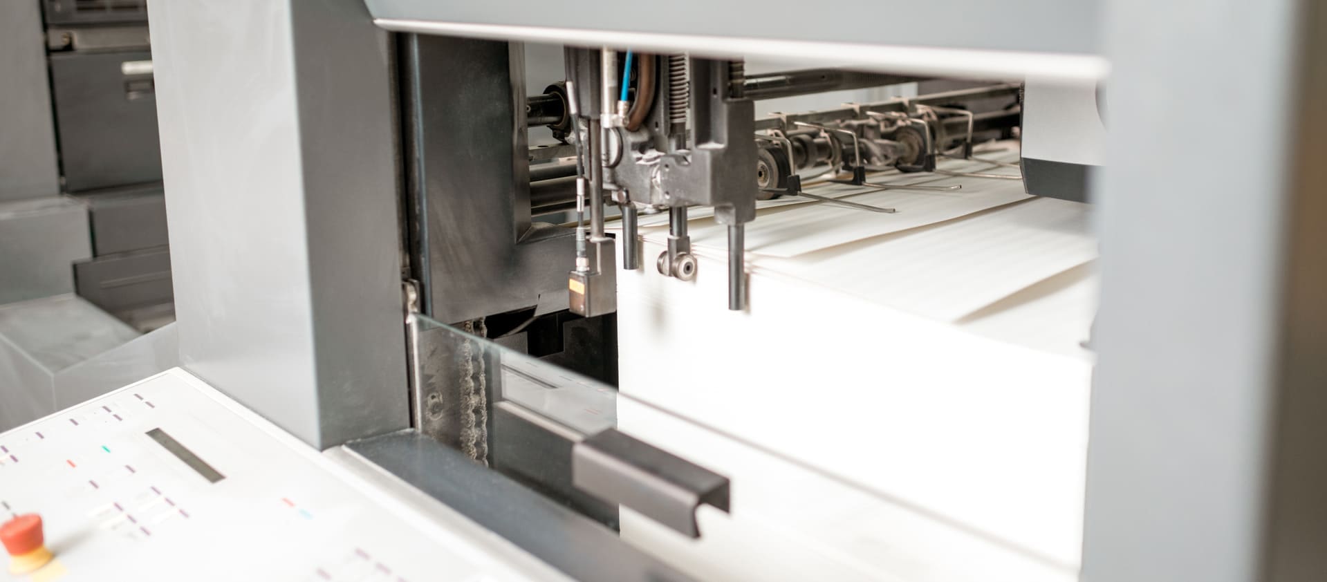 Close-up of commercial printing machinery